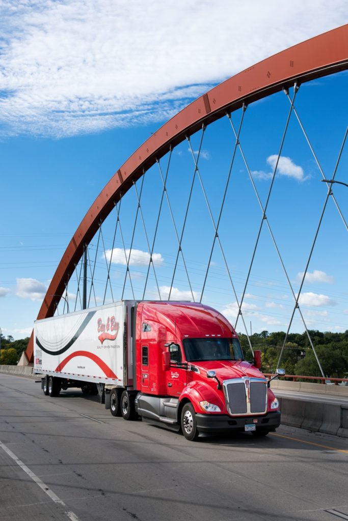 bay and bay truck driving on bridge