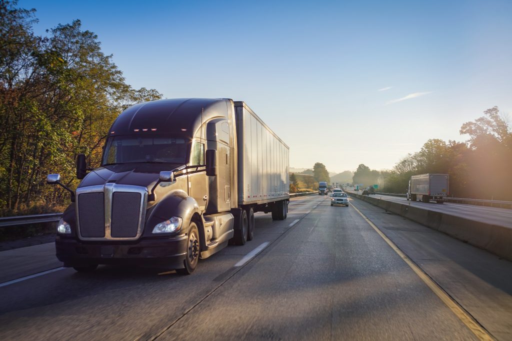 bay and bay truck on the road