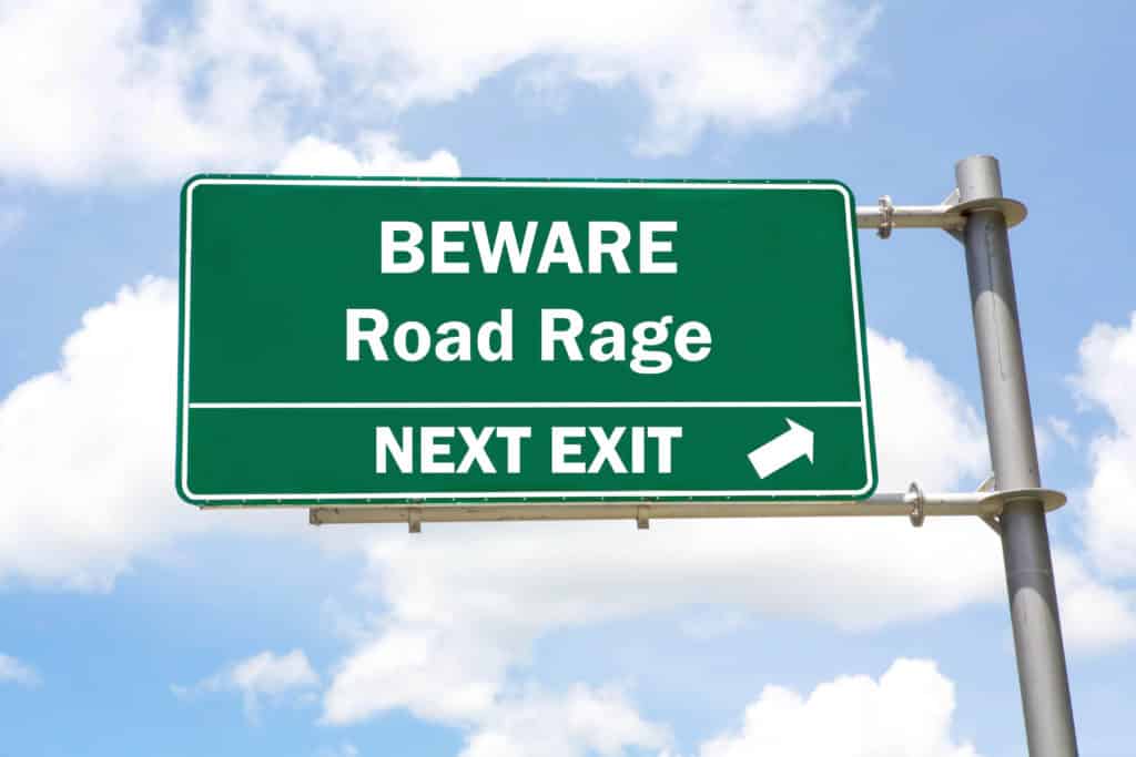 Road sign that reads "Beware Road Rage, Next Exit"