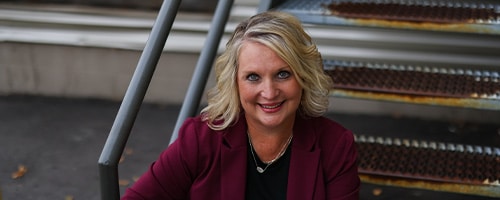 A headshot of Bay & Bay's President of Trucking, Lisa Gonnerman. A female in leadership at Bay & Bay Transportation.