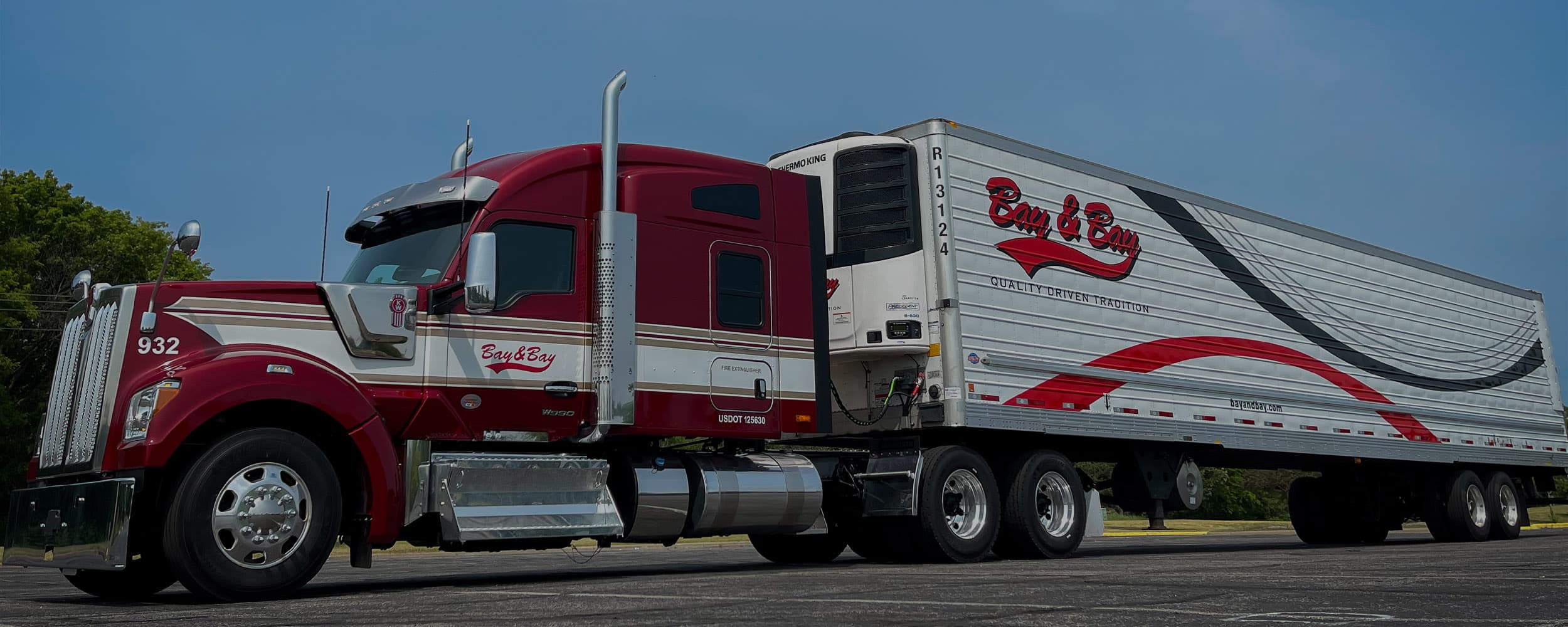 Red Lease Purchase Truck Kenworth W990 Bay and Bay Transportation